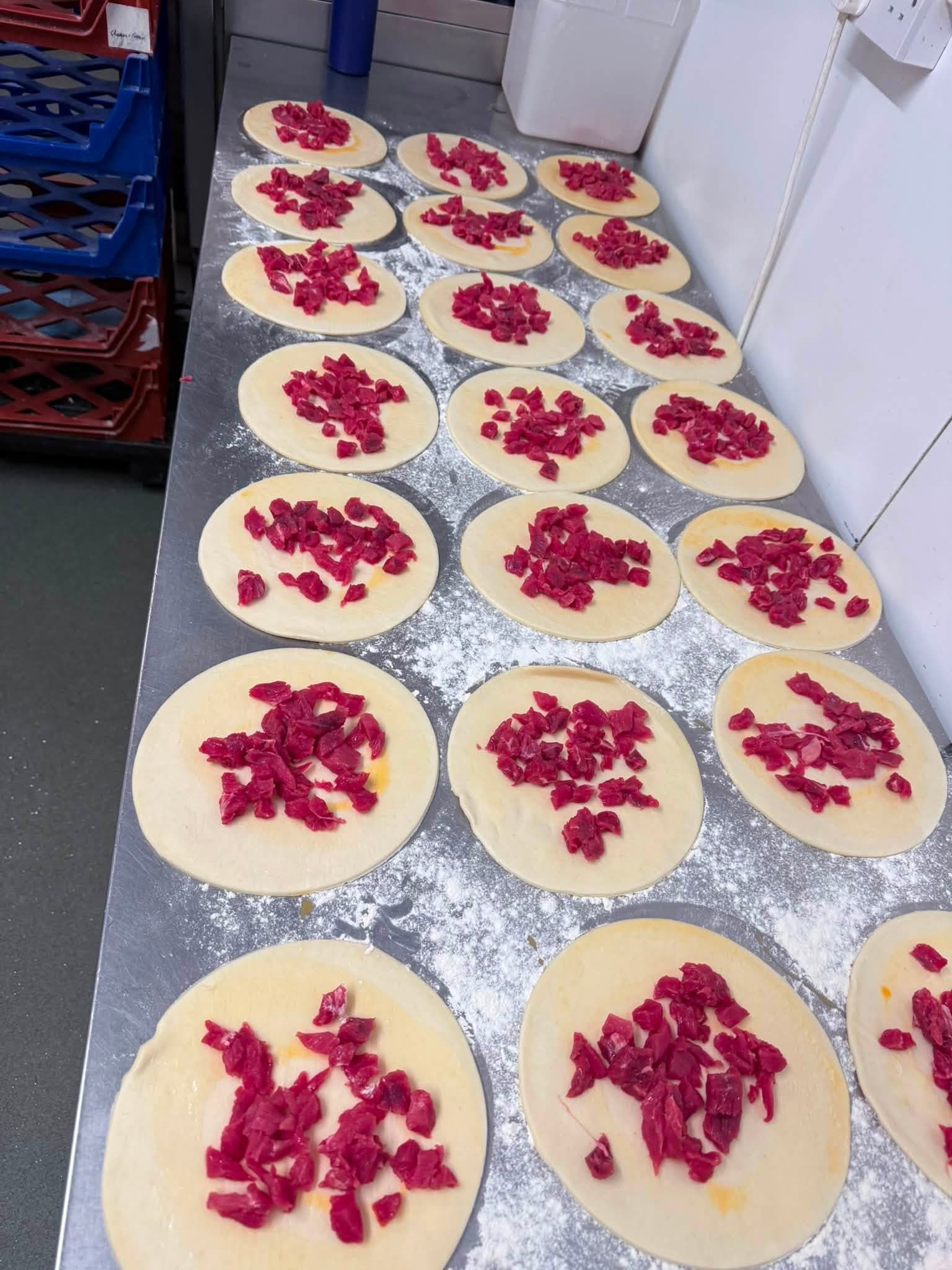 Hand-diced beef laid onto fresh pastry rounds in the Churston kitchen